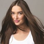 Young Girl with Long Flying Hair, Grey Background