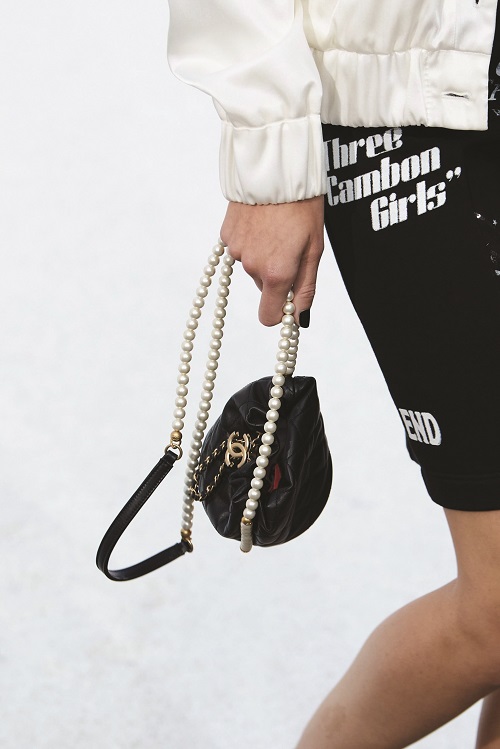 Chanel-Black-Drawstring-Bag-with-Pearl-Strap-Spring-2021-scaled